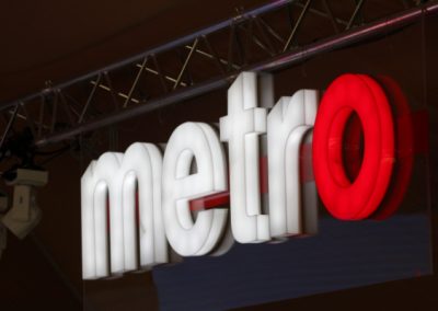 Photo of illuminated Metro logo
